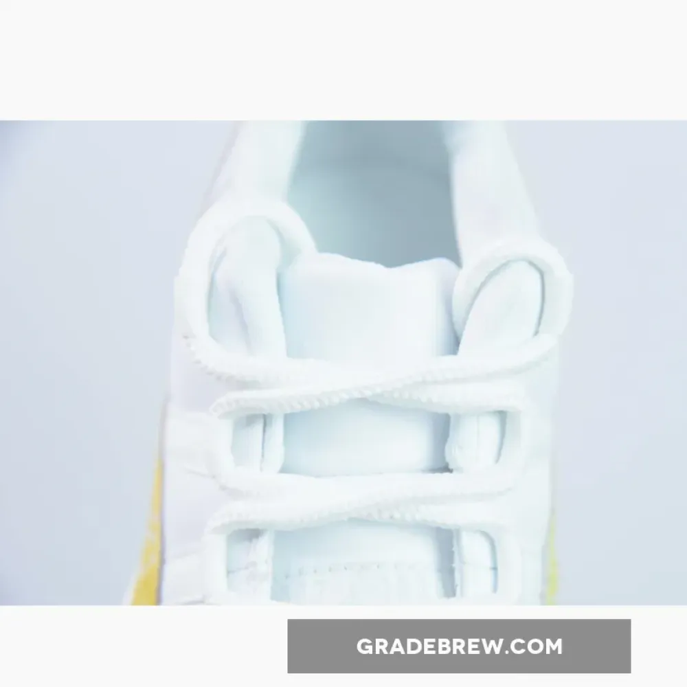 Air Jordan 11 Low Yellow Snakeskin White/Tour Yellow-Sail  AH7860-107